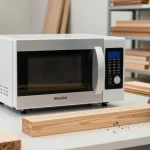 Shashel microwave equipment treating wood for pest elimination in a modern workshop.